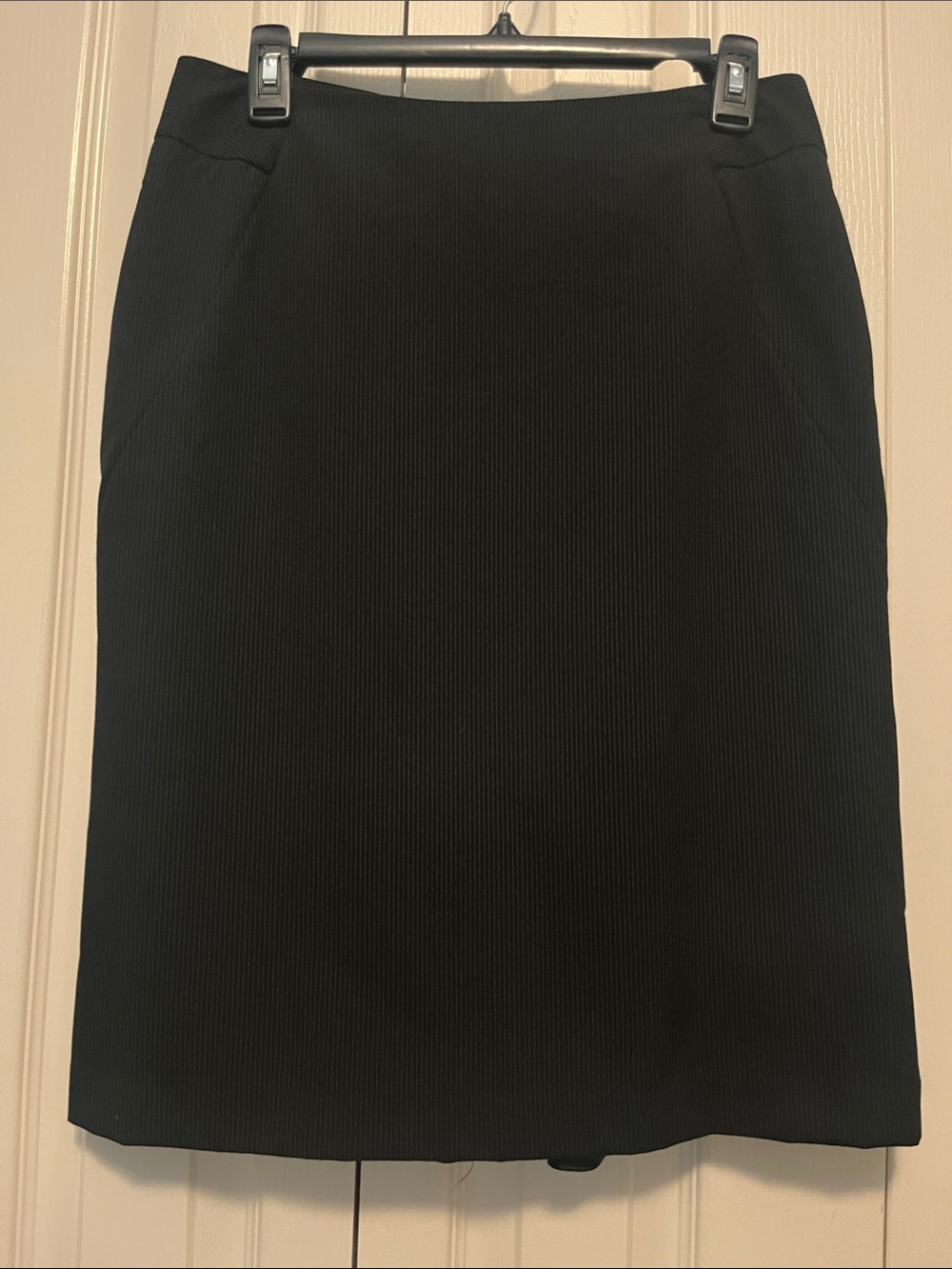 Rafaella pinstripe skirt with ruffed back hem. Size 6